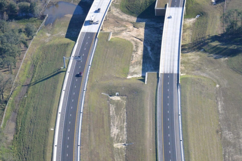 The contract work on this section of SR 429 (Wekiva Parkway) included construction of more than two miles of new roadway for a 4-lane limited-access toll highway, including access ramps. This project was completed on time with an aggressive schedule coordinated for opening this section of new roadway in conjunction with multiple adjacent projects.