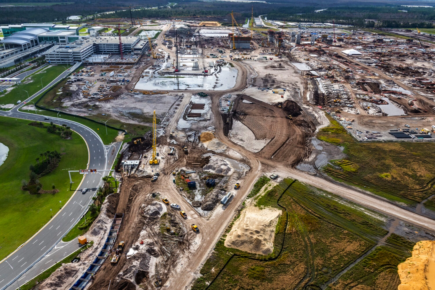 The Orlando International Airport HP GMP 5S.2 – Site, Civil, & Utilities project was delivered as a CM at risk by the Middlesex Corporation. The project was completed for the Greater Orlando Aviation Authority (GOAA) and covers the completed site for the South Terminal C landside terminal building, all associated roads, and utilities. In 2023, the project won the ENR Best Project, for the airport/transit category for the Southeast region.