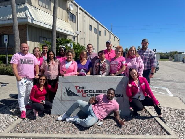 The Middlesex Corporation recognizes breast cancer awareness month in 2022 by wearing pink shirts.