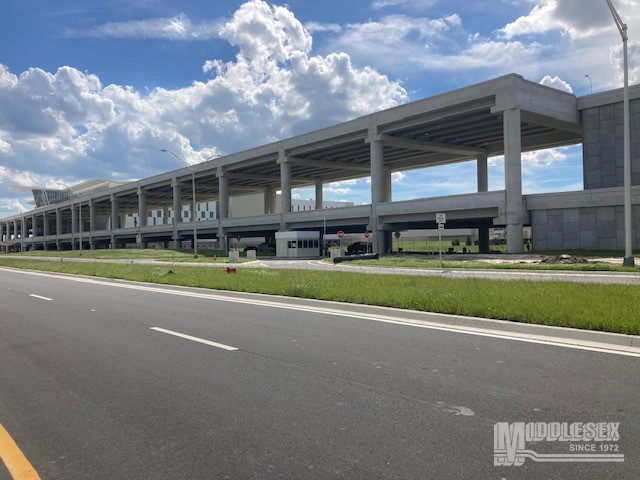 The Middlesex Corporation provided construction services for the enplane/deplane and pedestrian bridges at Orlando International Airport.