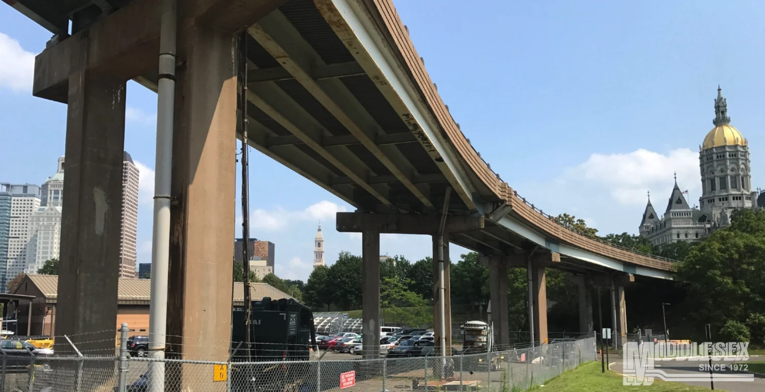 The Rehabilitation of Bridges on I-84 project was awarded to The Middlesex Corporation in 2017 and was completed in 2020 for the Connecticut Department of Transportation (CTDOT). This project was in Hartford, CT and consisted of superstructure and substructure repairs to approximately 6,400 LF of existing single-span bridges within the Hartford viaduct and spanning the CT Fastrak Busway and Amtrak Corridors.