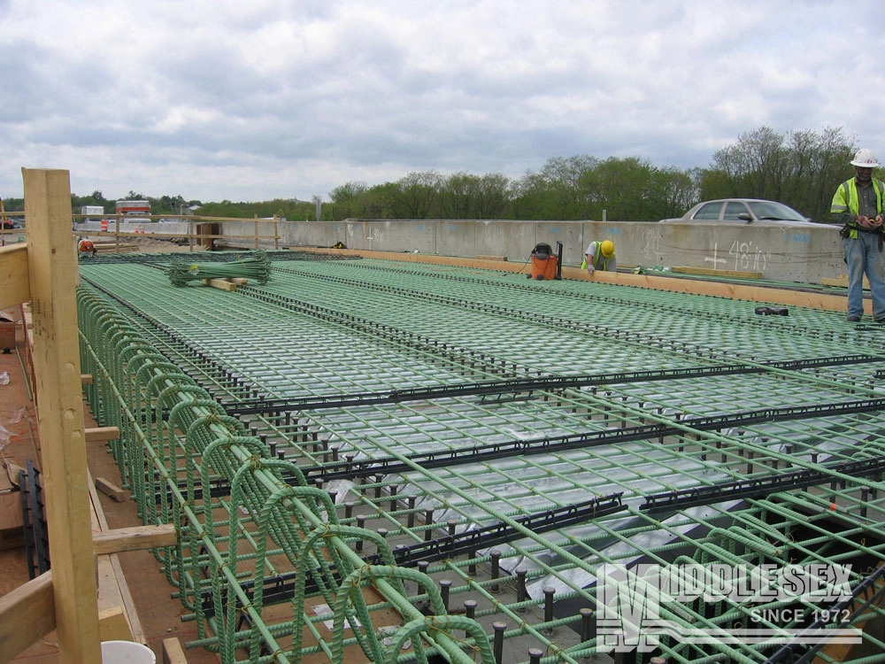 The I-495 Lowell Bridge Bundle, a Design-Build, was completed in 2011 for the Massachusetts Department of Transportation (massDOT). The project included the design and replacement of six bridges carrying I-495 northbound and south bound over the Concord River, the MBTA commuter rail tracks, and Woburn Street in Lowell, MA.