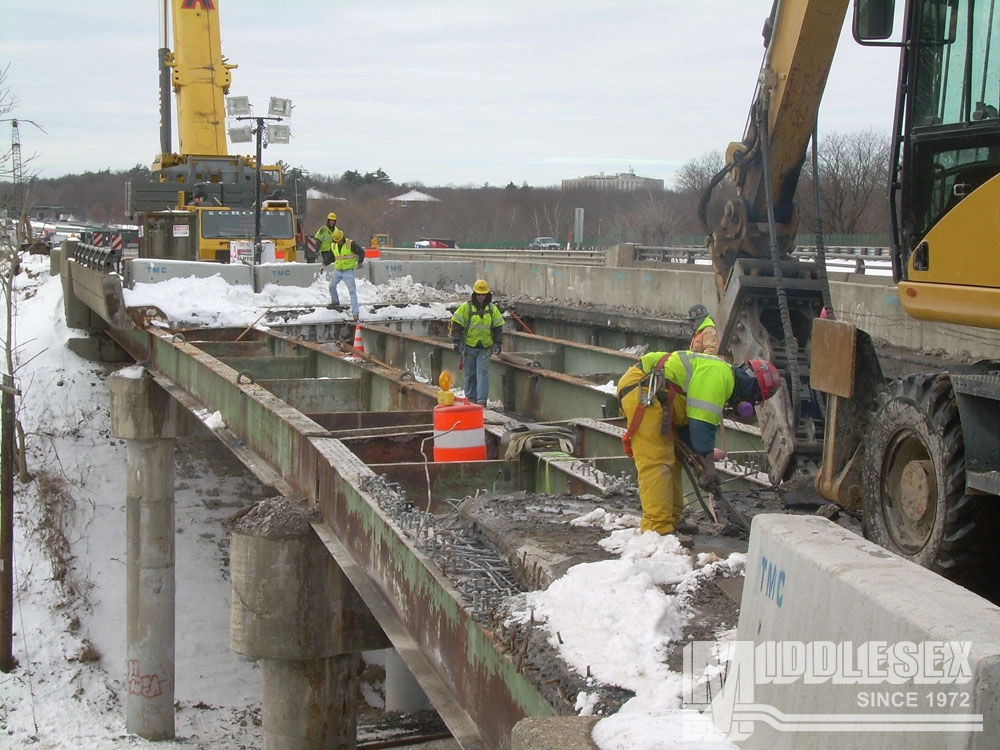 The I-495 Lowell Bridge Bundle, a Design-Build, was completed in 2011 for the Massachusetts Department of Transportation (massDOT). The project included the design and replacement of six bridges carrying I-495 northbound and south bound over the Concord River, the MBTA commuter rail tracks, and Woburn Street in Lowell, MA.