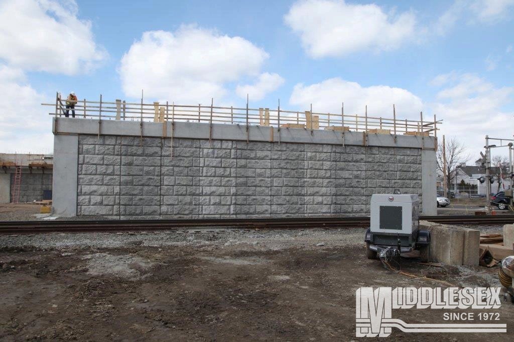 This project consisted of the construction of a 5.85 mile segment of the Busway that begins just north of Cedar Street in Newington and runs north to a point just north of Sigourney Street in Hartford. The project also included the construction of seven stations in New Britain, Newington, West Hartford and Hartford, a new bridge at Flatbush Avenue in West Hartford, and the construction of a new gravel access road for Amtrak.