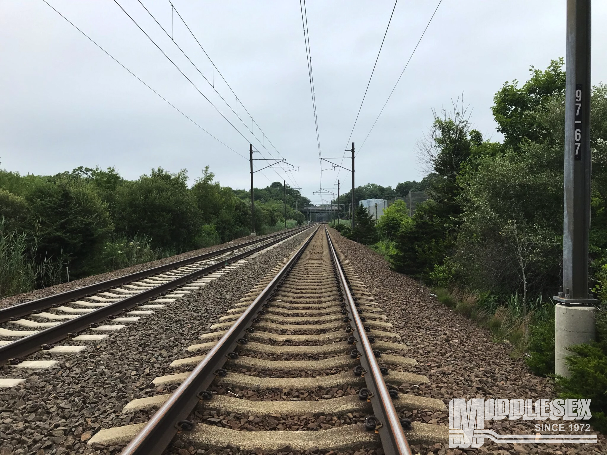 The Fitter Interlocking & Wetland Mitigation project is owned by Amtrak. Amtrak contracted the Middlesex Corporation for the bid-build project in 2022. Under a tight deadline of 21 months, the project included off-line civil and platform work, installing the underdrain within the railroad ballast, cleaning, and reconstructing existing drainage ditches and single-track closures. The project won the CCIA Safety Recognition Award in 2023.