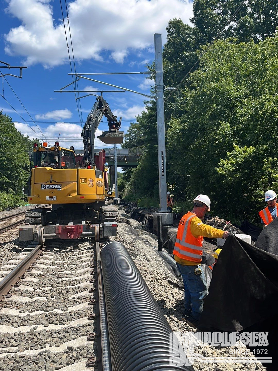 The Fitter Interlocking & Wetland Mitigation project is owned by Amtrak. Amtrak contracted the Middlesex Corporation for the bid-build project in 2022. Under a tight deadline of 21 months, the project included off-line civil and platform work, installing the underdrain within the railroad ballast, cleaning, and reconstructing existing drainage ditches and single-track closures. The project won the CCIA Safety Recognition Award in 2023.