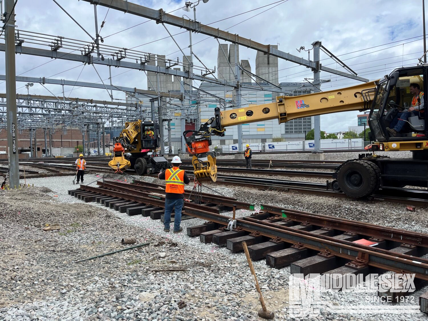 The Middlesex Corporation is rebuilding and upgrading the South Station Tower 1 Interlocking for the Massachusetts Bay Transportation Authority (MBTA) in Boston, MA. The bid build project includes replacement of trackwork, installing the foundation and platform work for a new central instrument house, upgrading the existing relay-based signal system, replacing the existing back-up power generator, installing new lights and floodlights, additions to the communication and security systems, and the replacement of trackwork and associated signal infrastructure within the cove interlocking area.