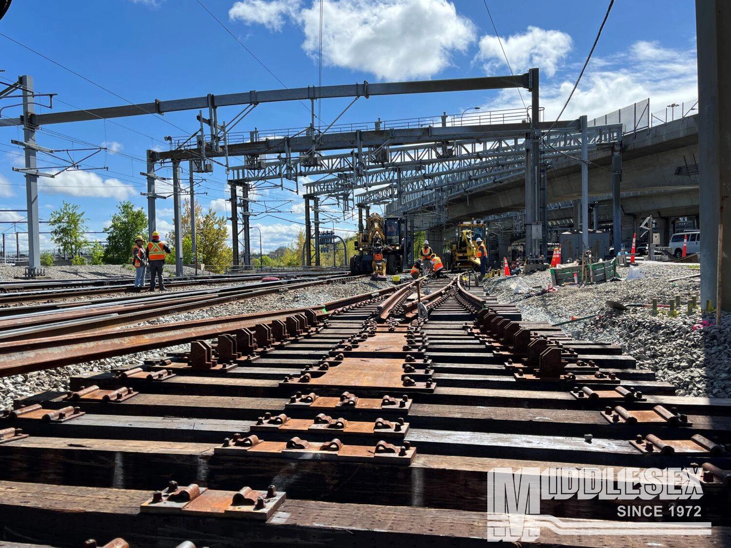 The Middlesex Corporation is rebuilding and upgrading the South Station Tower 1 Interlocking for the Massachusetts Bay Transportation Authority (MBTA) in Boston, MA. The bid build project includes replacement of trackwork, installing the foundation and platform work for a new central instrument house, upgrading the existing relay-based signal system, replacing the existing back-up power generator, installing new lights and floodlights, additions to the communication and security systems, and the replacement of trackwork and associated signal infrastructure within the cove interlocking area.